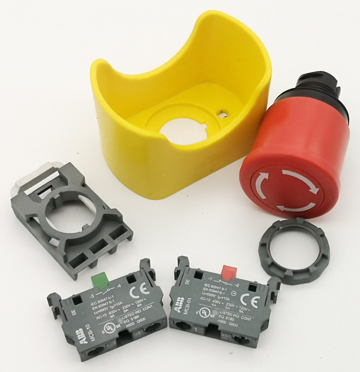 Корпус кнопки красной стоп ABB MPMT4-10R 1SFC151286V0001 с кожухом жёлтым CA1-8053 1SFC151282F0001 в сборе